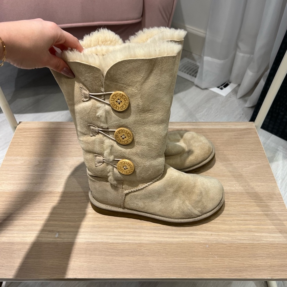 Uggs sand tall with buttons size 7